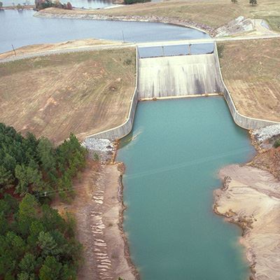 A spillway with water pouring over