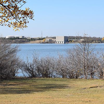 A raw water pump station from across a lake