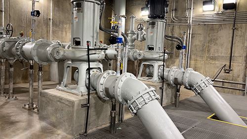 Large pipes in a concrete room